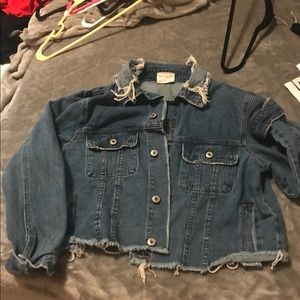 Distressed blue jean jacket
